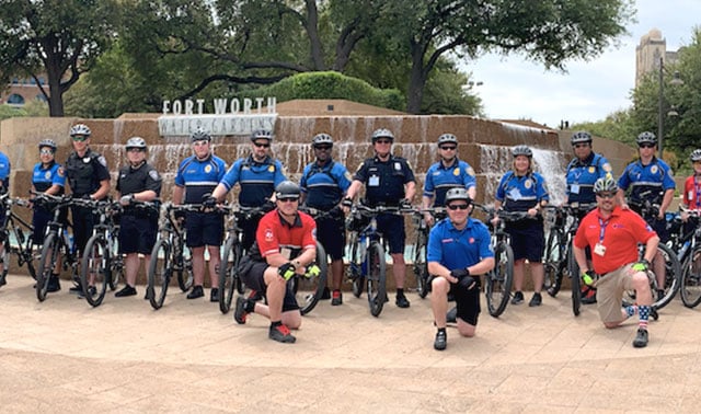 Fort Worth bike patrol team gathered near Water Gardens, symbolizing local community connection and trusted business presence